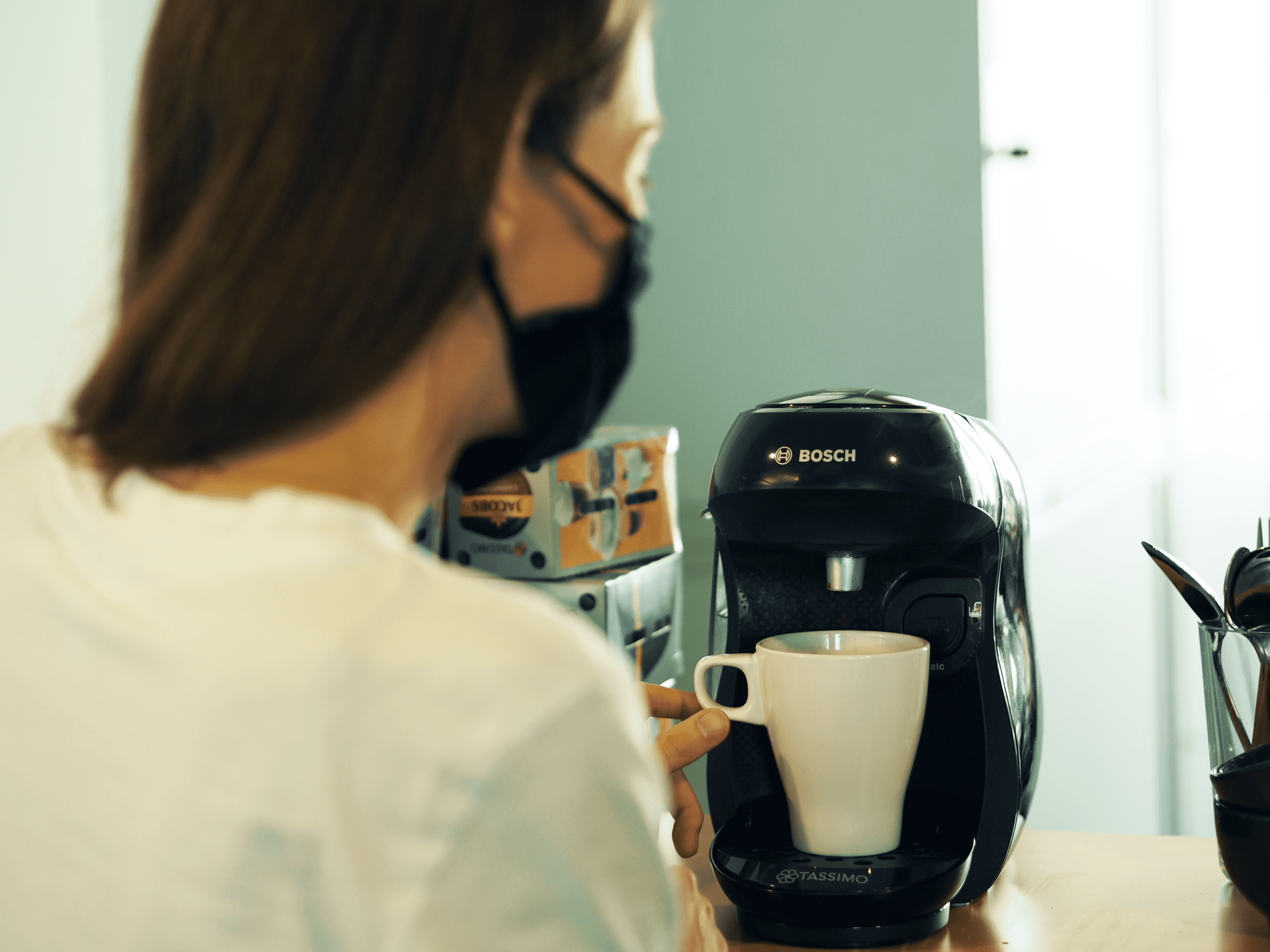 Blickfeld employee with coffee machine